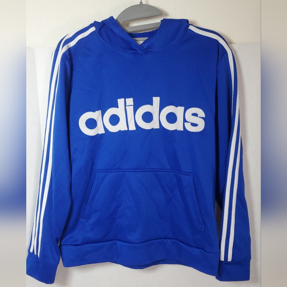 Adidas Blue Hoodie with White LogoThis Adidas youth pullover hoodie is perfect f